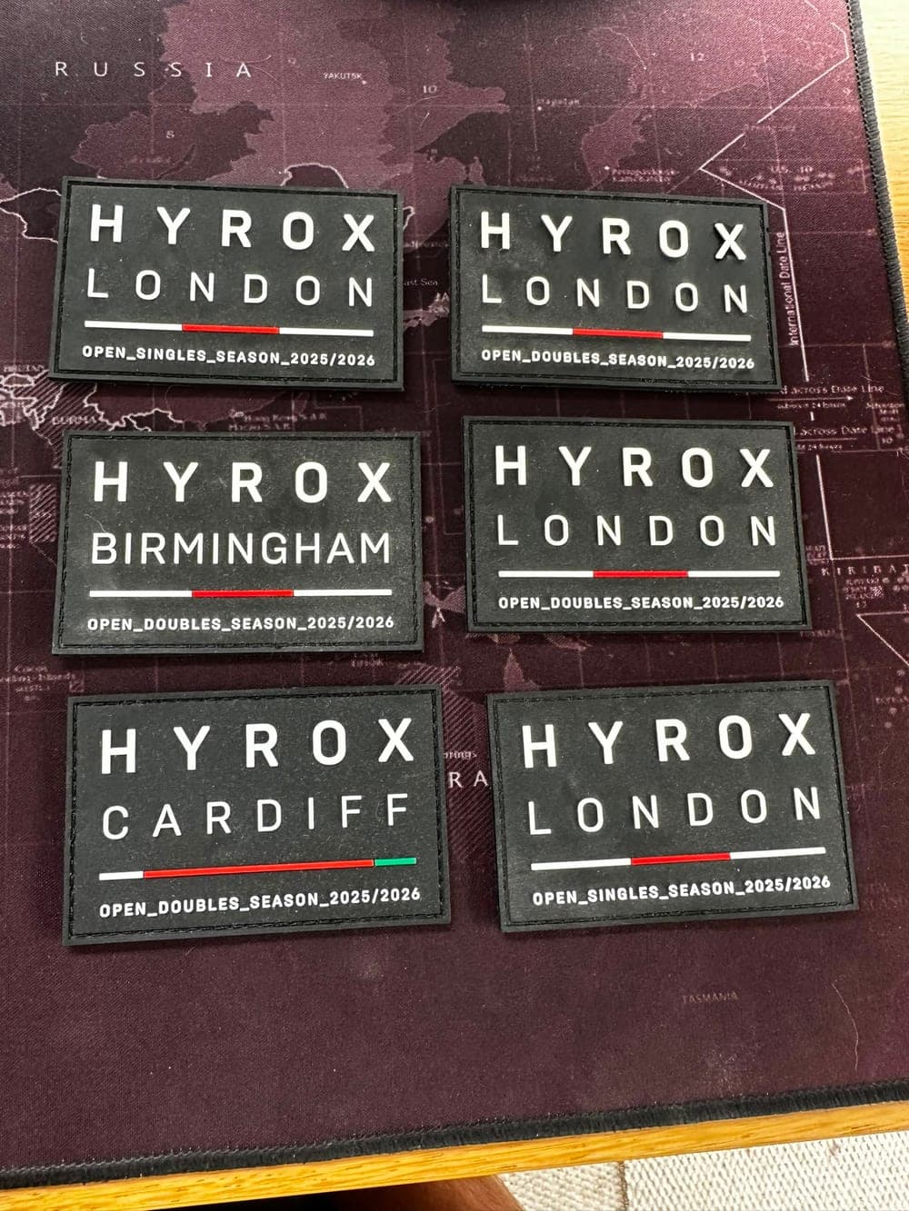 Six HYROX race patches from London, Birmingham and Cardiff
